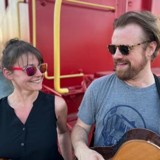 A modern Violin and Acoustic guitar Wedding duo.