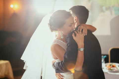 Bride and groom embracing